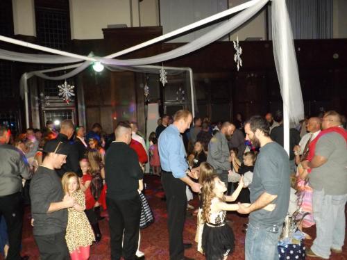 The dance floor is full at the Daddy - Daughter Dance